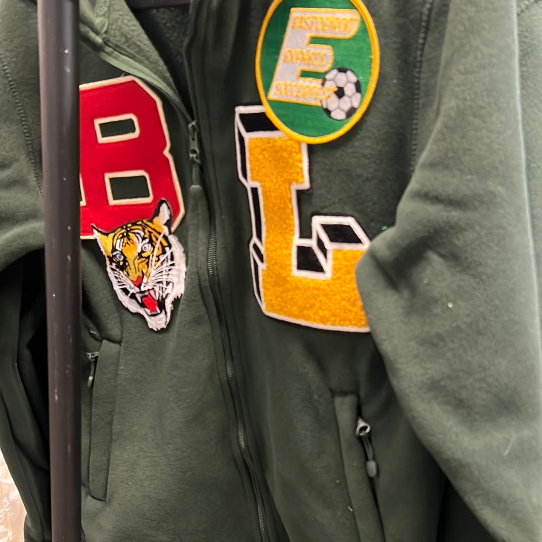 Green fleece varsity